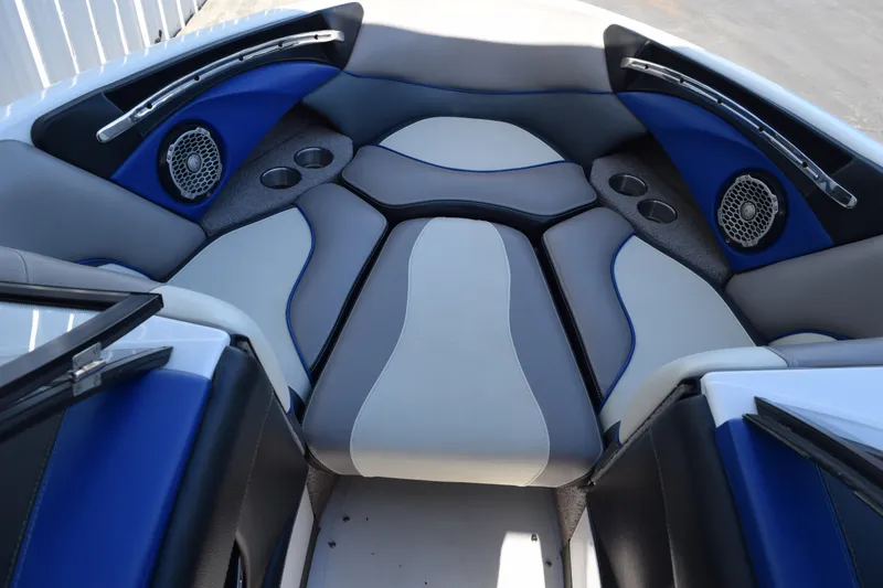 Slide: The Image of Interior of 2013 Malibu Wakesetter 23 LSV boat with blue and gray seating. - 14