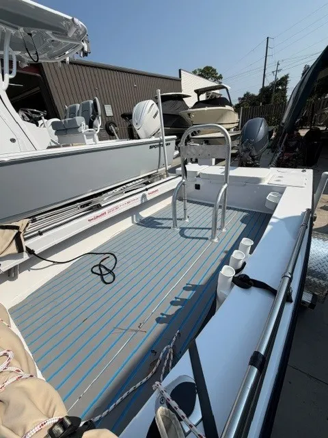 Slide: The Image of A 2024 Salt Boatworks Flats River Skiff 15 with an open deck and seating. - 12