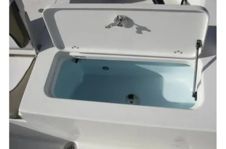 Slide: The Image of An open storage compartment on a 2021 Key West 210 Bay Reef boat. - 14