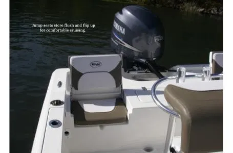 Slide: The Image of The image shows the stern of a Key West 210 Bay Reef boat with a Yamaha engine. - 8