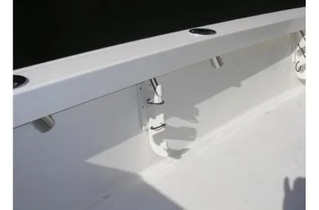Slide: The Image of The image shows the interior of a boat with rod holders on the side. - 11