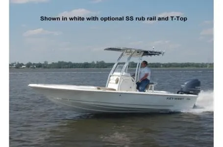 Slide: The Image of A white boat with optional SS rub rail and T-Top cruising on calm waters. - 24