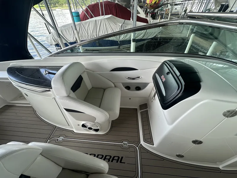 Slide: The Image of The image shows the cockpit of a 2011 Chaparral 287 SSX with white leather seats and a sleek dashboard. - 17