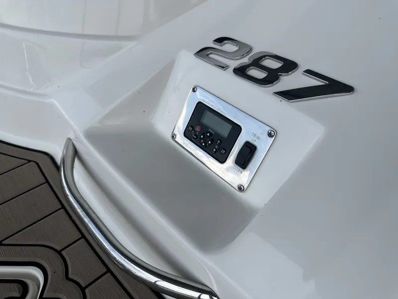 Slide: The Image of Close-up of a Chaparral 287 SSX boat with control panel and model number. - 4