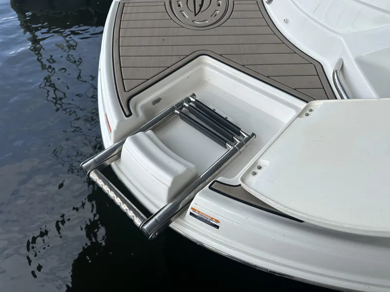 Slide: The Image of The image shows a swim platform with a retractable ladder at the stern of a boat. - 5