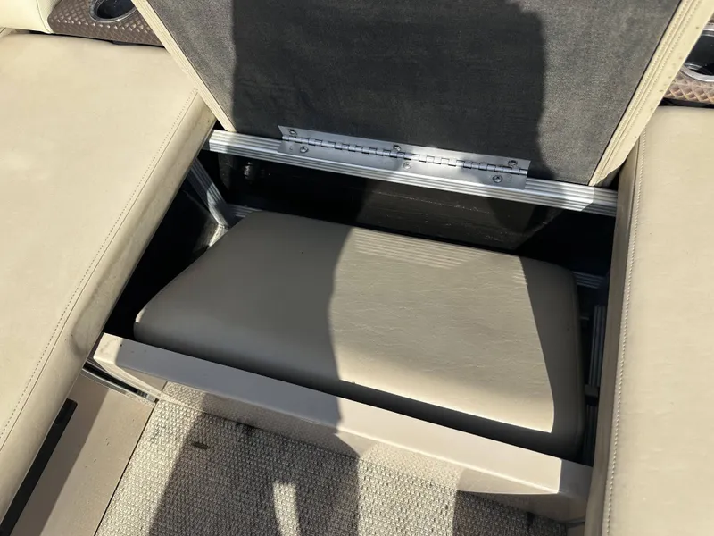 Slide: The Image of A seating area with a lifted backrest reveals storage space underneath. - 11