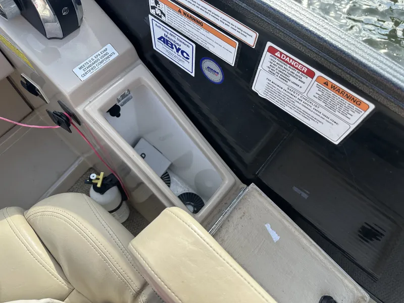 Slide: The Image of View of a 2017 Crest Classic 250SL CP3 cockpit with safety labels visible. - 24