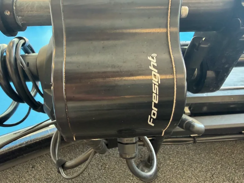 Slide: The Image of Close-up of a boat motor labeled "Foresight." Cables are visible. - 25