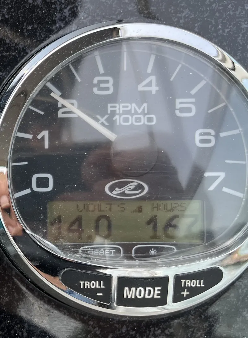 Slide: The Image of Tachometer of a 2007 Sea Ray 240 Sundancer showing RPM and digital displays. - 10