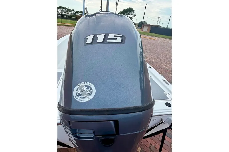 Slide: The Image of Outboard motor on 2016 Sportsman Island Bay 20 boat, featuring ultra-low emission technology. - 12