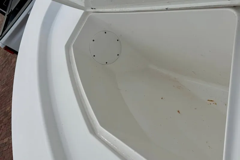 Slide: The Image of Open storage compartment of a 2016 Sportsman Island Bay 20 boat. - 33