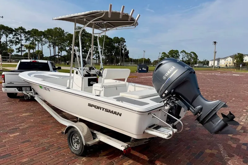 Slide: The Image of 2016 Sportsman Island Bay 20 boat on trailer with Yamaha outboard motor. - 4