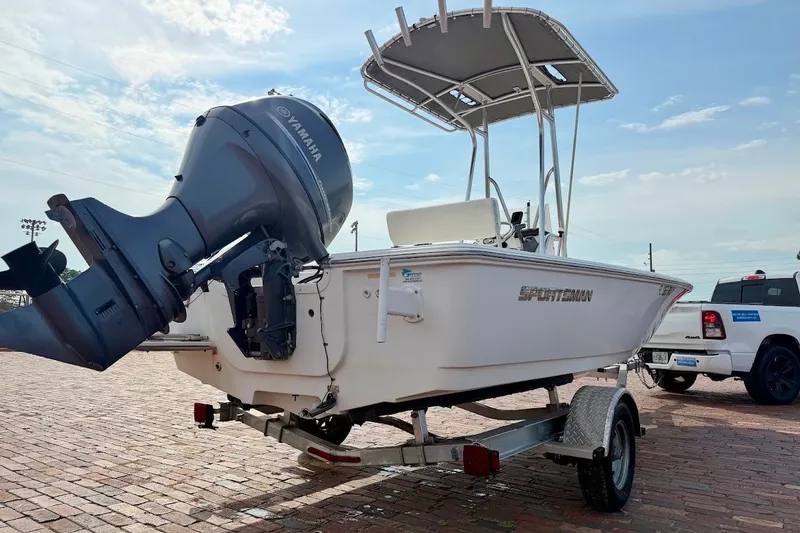 Slide: The Image of 2016 Sportsman Island Bay 20 boat on trailer with Yamaha outboard motor. - 3