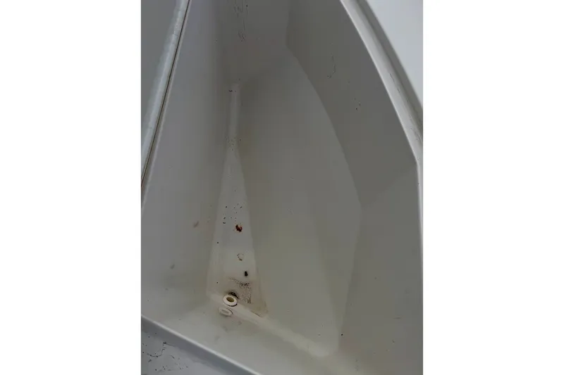 Slide: The Image of Interior view of a 2016 Sportsman Island Bay 20 boat compartment. - 32