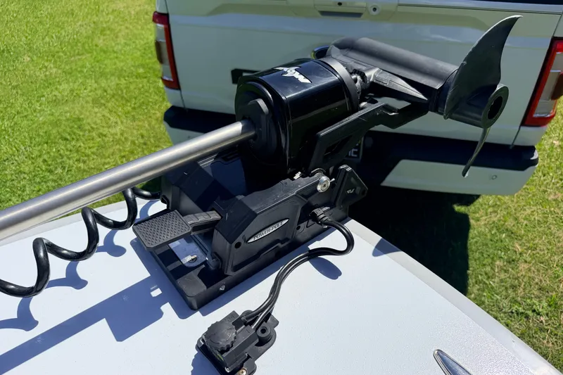 Slide: The Image of Trolling motor on a 2019 Beavertail Skiffs Vengeance 18', parked on grass. - 23
