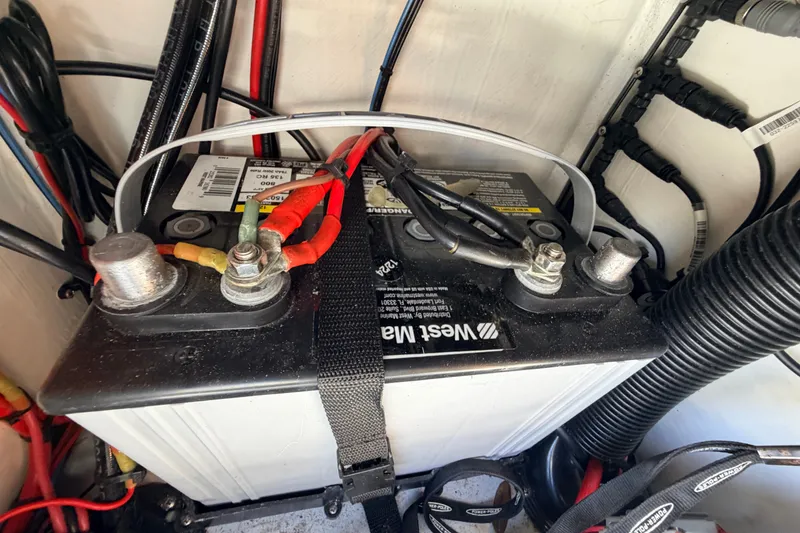 Slide: The Image of Battery setup in a 2019 Beavertail Skiffs Vengeance 18' boat, featuring West Marine battery. - 45