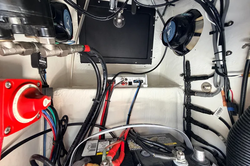 Slide: The Image of 2019 Beavertail Skiffs Vengeance 18' electrical system with wiring and battery setup. - 44