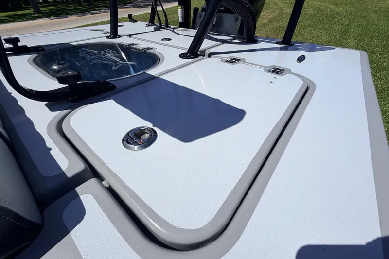 Slide: The Image of 2019 Beavertail Skiffs Vengeance 18' deck with storage compartments and sleek design. - 55