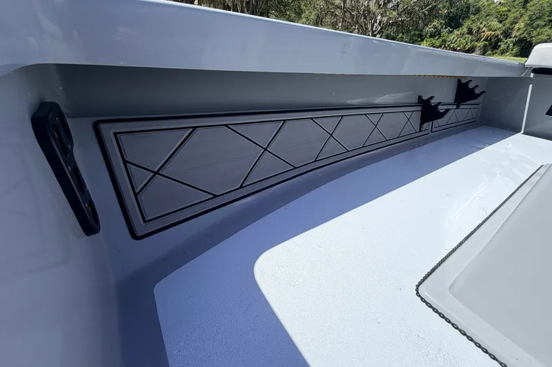 Slide: The Image of 2019 Beavertail Skiffs Vengeance 18' interior detail with geometric design and rod holders. - 28