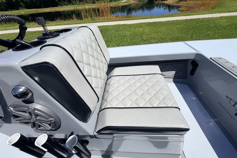 Slide: The Image of 2019 Beavertail Skiffs Vengeance 18' boat interior with quilted seating and speaker system. - 33