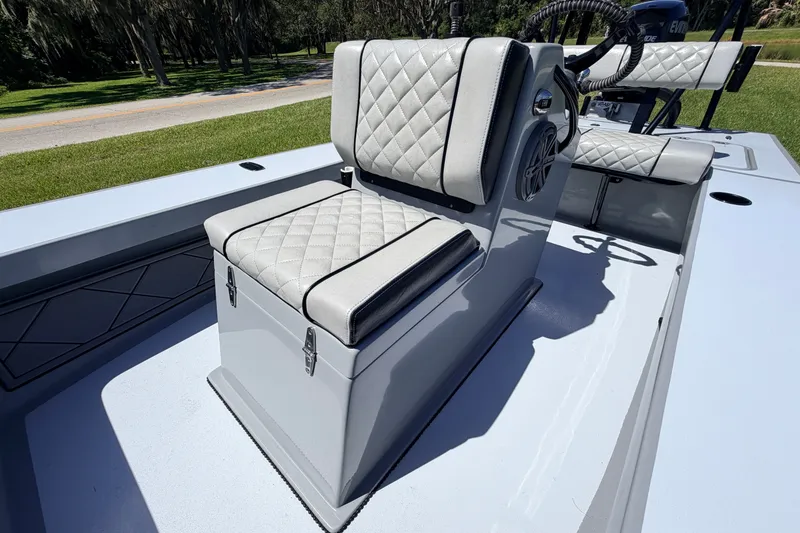 Slide: The Image of 2019 Beavertail Skiffs Vengeance 18' boat with quilted seating and steering console. - 31