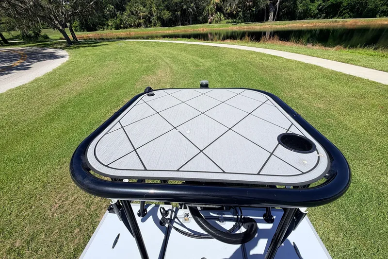Slide: The Image of 2019 Beavertail Skiffs Vengeance 18' poling platform on grassy landscape. - 62