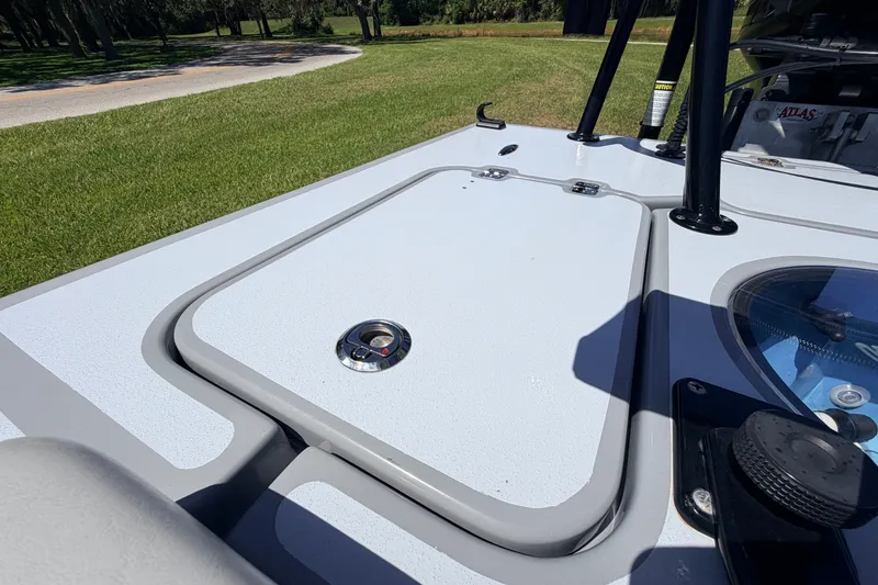 Slide: The Image of 2019 Beavertail Skiffs Vengeance 18' deck with storage hatch and fishing rod holders. - 50