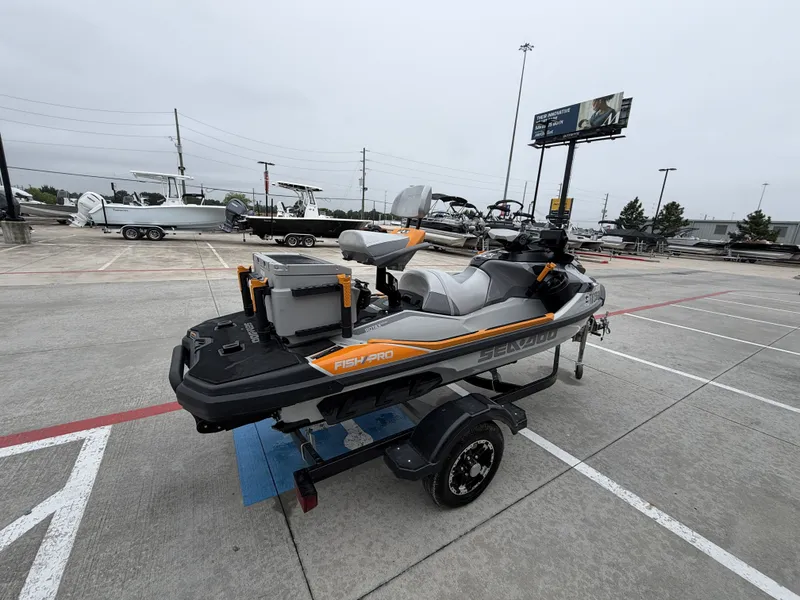 Slide: The Image of A 2022 Sea-Doo FISH PRO TROPHY 170 on a trailer, ready for use. - 8
