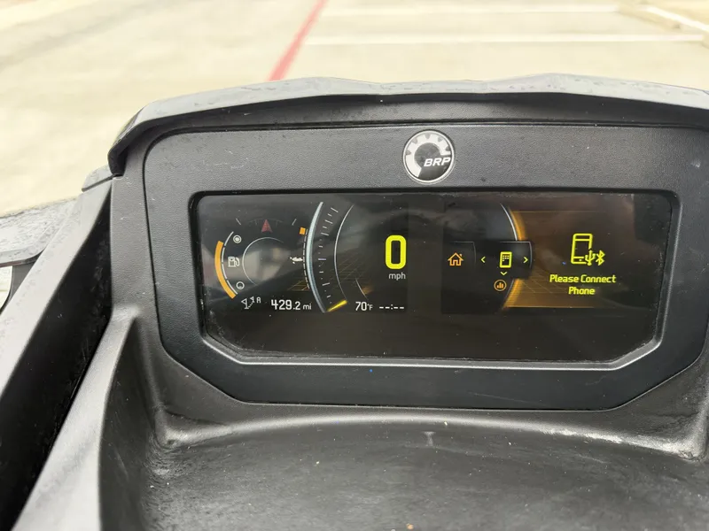 Slide: The Image of The image shows the dashboard of a 2022 Sea-Doo FISH PRO TROPHY 170 with digital displays. - 12