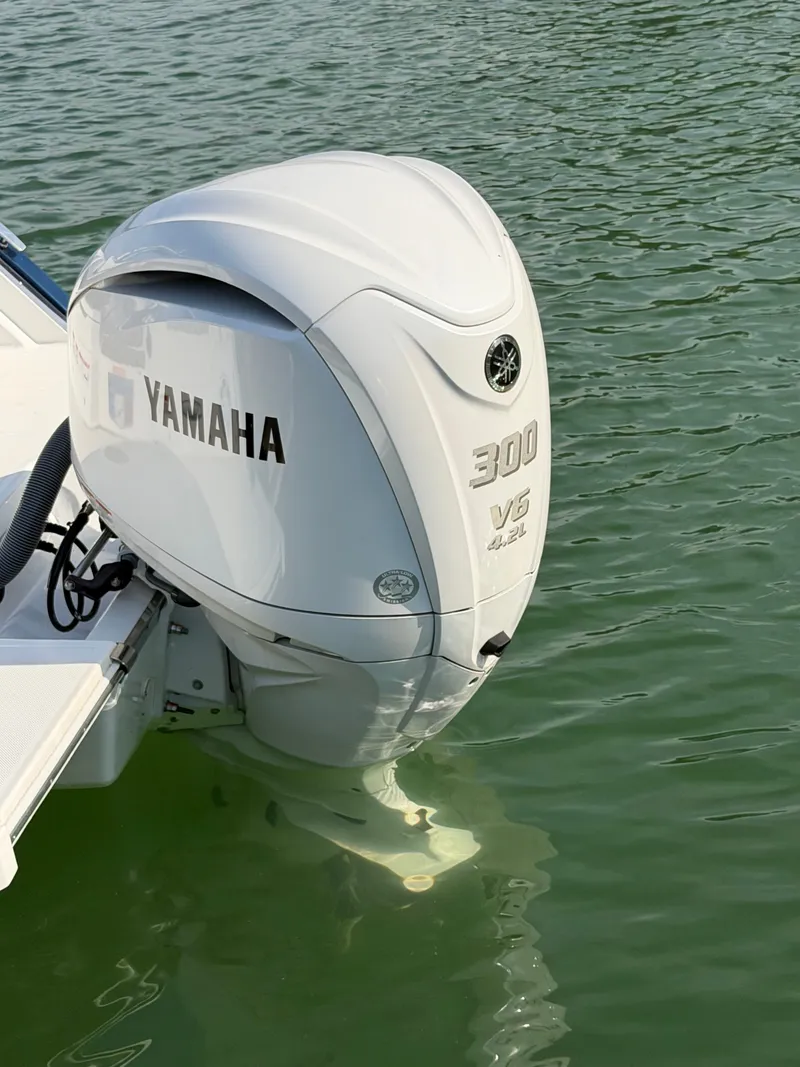 Slide: The Image of A Yamaha 300 HP V6 outboard motor on a Cobalt R6 boat in the water. - 4