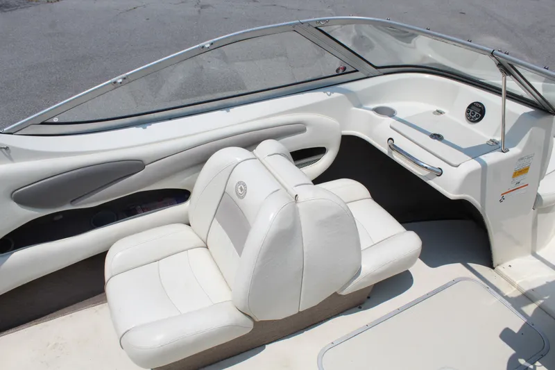 Slide: The Image of The image shows the cockpit of a 2012 Stingray 185 LS with white leather seats. - 11