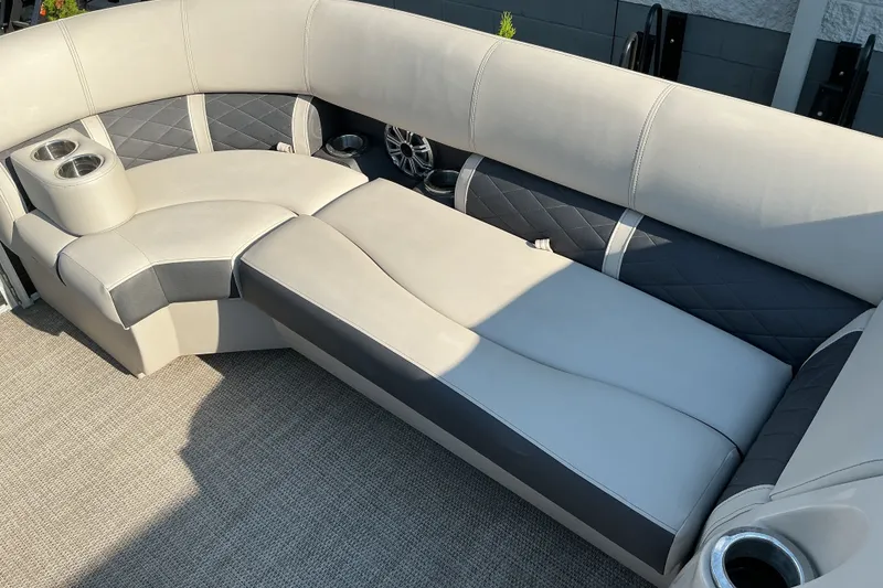Slide: The Image of Luxurious seating on a 2019 Bennington 22 SSLX pontoon boat with cup holders and stylish upholstery. - 6
