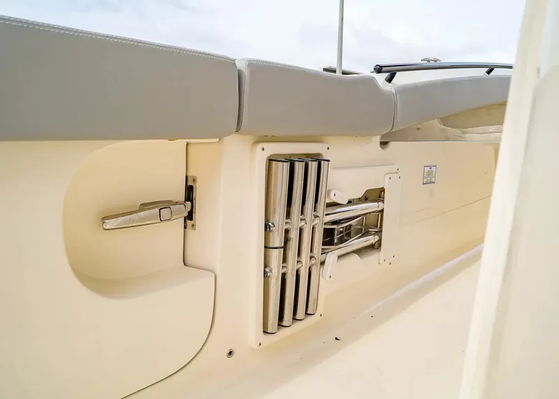 Slide: The Image of The 2027 Scout 330 LXF features a sleek, cream-colored interior with stainless steel accents. - 15