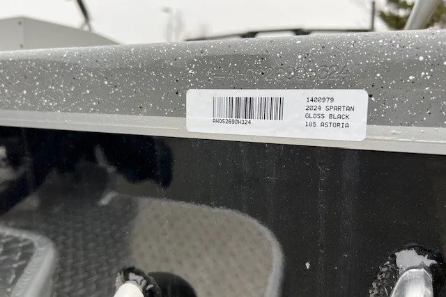 Slide: The Image of 2024 Spartan 185 Astoria boat in gloss black with barcode label. - 5