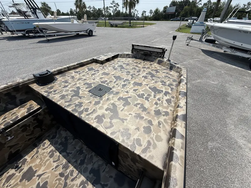 Slide: The Image of Excel Boats Viper F4 1751 with aluminum trailer, year 2027, featuring a camouflage pattern. - 8