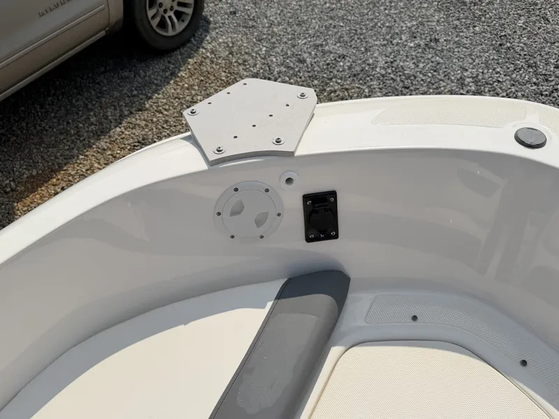 Slide: The Image of The image shows the deck of a 2018 Bayliner 180 Element XL with gray upholstery. - 8