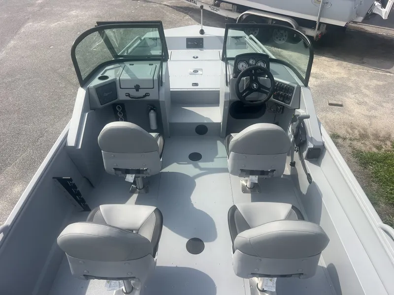 Slide: The Image of The image shows the cockpit of a 2027 G3 Sportsman 2100-CATFISH boat with four seats. - 3