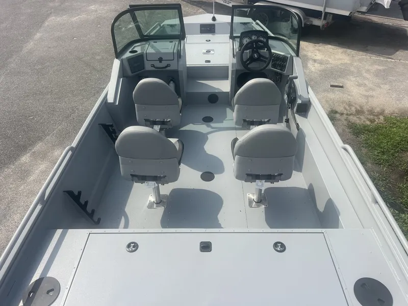 Slide: The Image of The image shows a 2027 G3 Sportsman 2100-CATFISH boat with four seats and a helm station. - 7