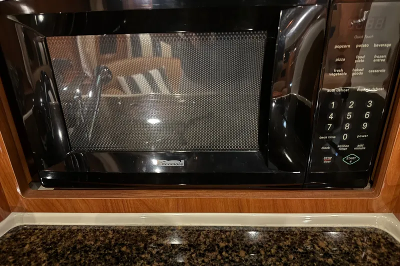 Slide: The Image of Kenmore microwave in 2006 Four Winns 348 Vista boat kitchen, granite countertop. - 42