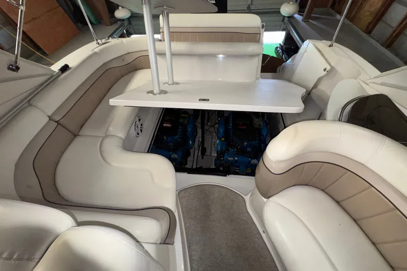 Slide: The Image of 2006 Four Winns 348 Vista boat interior with seating and engine compartment. - 18