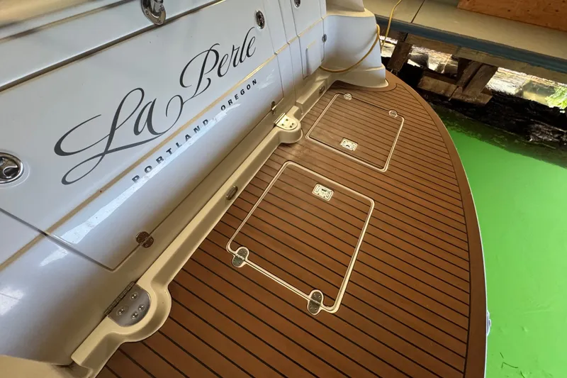 Slide: The Image of 2006 Four Winns 348 Vista boat deck with wood finish, docked in Portland, Oregon. - 26