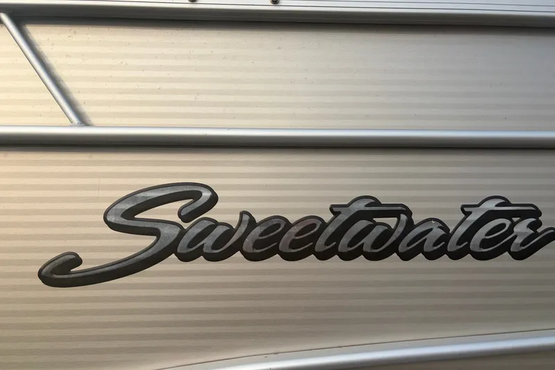 Slide: The Image of Sweetwater 2286 2015 model logo on metallic surface. - 5