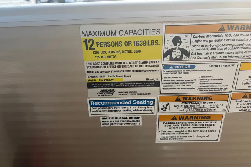 Slide: The Image of Sweetwater 2286 boat capacity and safety warnings, 2015 model, 12 persons or 1639 lbs. - 15
