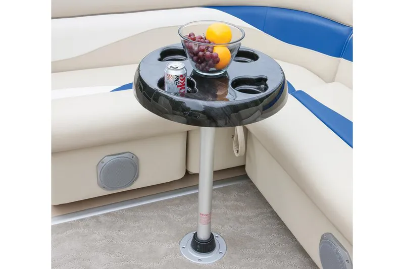 Slide: The Image of Manufacturer Provided Image: Round table with fruit bowl and drink on Sweetwater 2286 boat, 2015 model. - 3