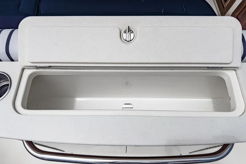 Slide: The Image of Open storage compartment on 2020 Hunt Yachts Surfhunter 32 boat interior. - 26