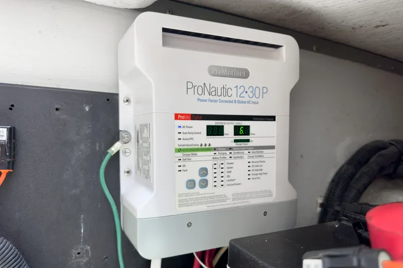Slide: The Image of ProNautic 12-30P charger installed on a 2020 Hunt Yachts Surfhunter 32 boat. - 64