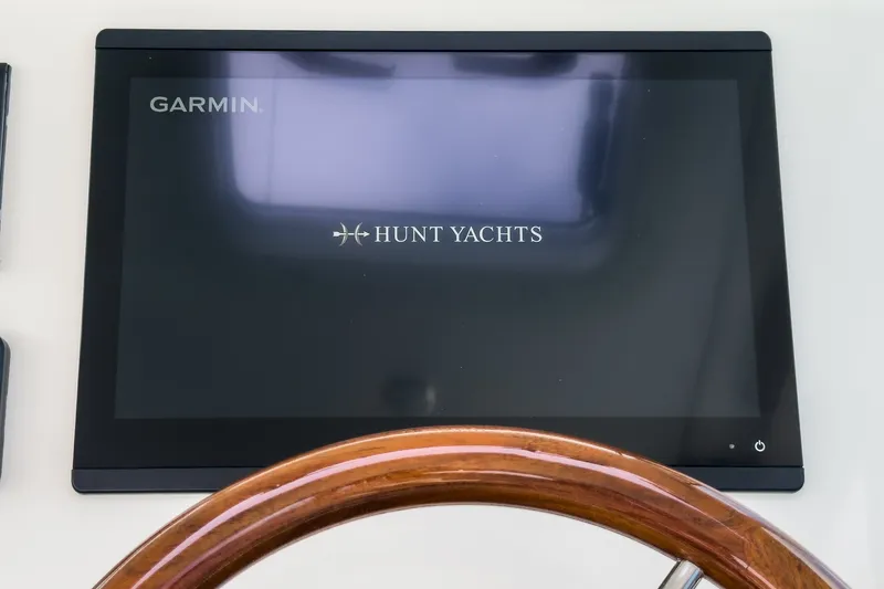 Slide: The Image of Garmin display on 2020 Hunt Yachts Surfhunter 32 with wooden steering wheel. - 38