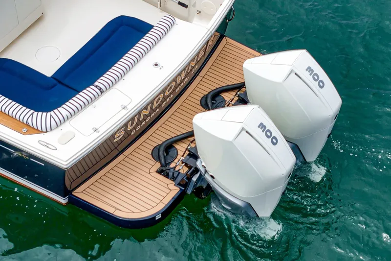 Slide: The Image of 2020 Hunt Yachts Surfhunter 32 with twin outboard engines on teak deck. - 59