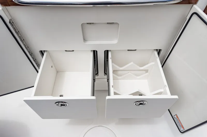 Slide: The Image of Hunt Yachts Surfhunter 32 (2020) interior storage drawers, open and empty. - 27