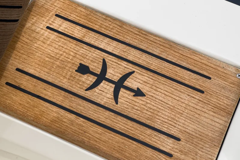 Slide: The Image of Wooden deck detail of 2020 Hunt Yachts Surfhunter 32 with arrow design. - 69